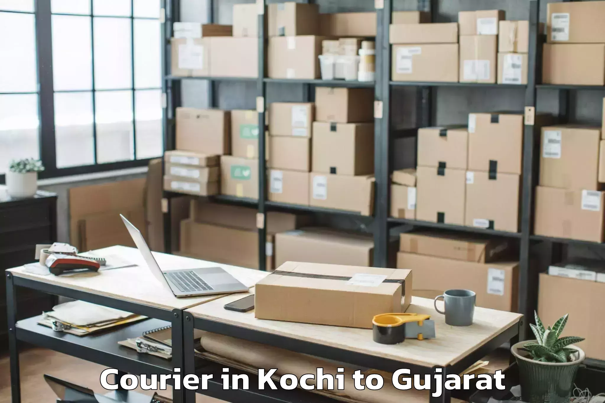 Professional Kochi to Vaghodia Ina Courier